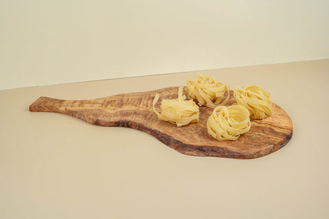 Shaped Olive wood serving board